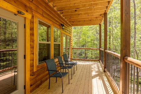 Deck seating at Poolin Around, a 2 bedroom cabin rental located in gatlinburg