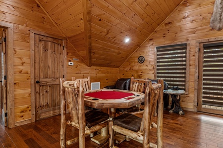 Poker table at Four Seasons Grand, a 5 bedroom cabin rental located in Pigeon Forge