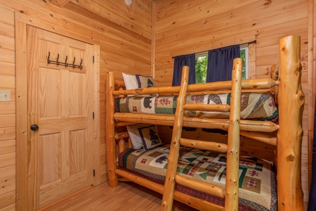 Two sets of twin bunks in a bedroom at License to Chill, a 3 bedroom cabin rental located in Gatlinburg