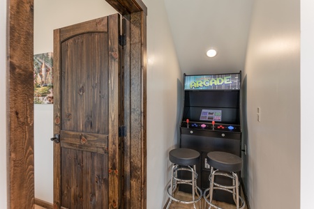 Arcade game at Mountain Celebration, a 4 bedroom cabin rental located in Gatlinburg