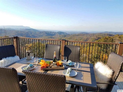 Deck dining for 6 at The Best View Lodge, a 5 bedroom cabin rental located in gatlinburg
