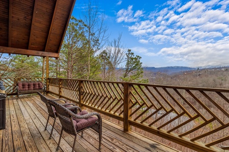Deck seating and view at Brink of Heaven, a 2 bedroom cabin rental located in Gatlinburg