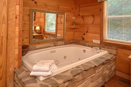 Jacuzzi in the bedroom area at Wild Crush, a 1 bedroom cabin rental located in Pigeon Forge