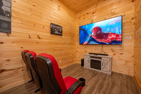 Theater flat screen at Mountain Pool & Paradise, a 3 bedroom cabin rental located in Pigeon Forge
