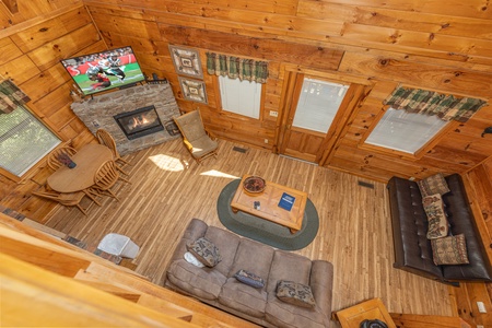 Looking down at the living room at Honeymoon in Gatlinburg, a 1 bedroom cabin rental located in Gatlinburg