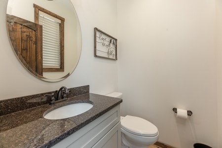 Half bath at Mountain Celebration, a 4 bedroom cabin rental located in Gatlinburg