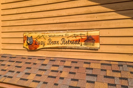 Custom sign at Lazy Bear Retreat, a 4 bedroom cabin rental located in Pigeon Forge