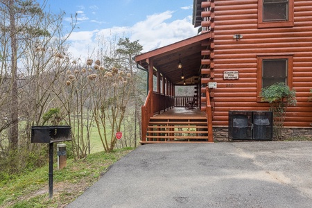 Parking and front porch at Mountain View Meadows, a 3 bedroom cabin rental located in Pigeon Forge