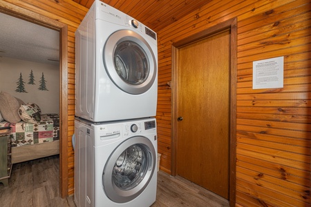 Washer and dryer in the jacuzzi bathroom at Magic Moments, a 2 bedroom cabin rental located in Pigeon Forge