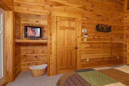 TV in a bedroom at Sensational Views, a 3 bedroom cabin rental located in Gatlinburg