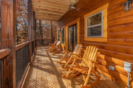 Deck with rocking chairs at Pinot Splash, a 4 bedroom cabin rental located in Gatlinburg