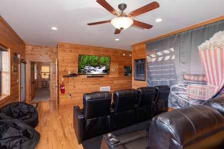 Theater room with bean bags and eight recliners at Great View Lodge, a 5-bedroom cabin rental located in Pigeon Forge