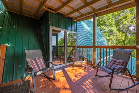 Rocking chairs on covered deck at Soaring Heights