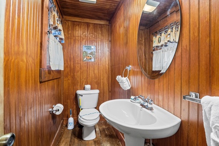 Half bath at A Beary Nice Cabin, a 2 bedroom cabin rental located in Pigeon Forge