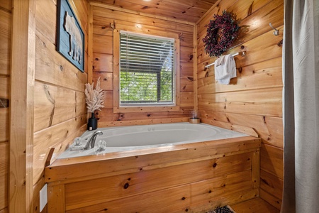Jacuzzi tub at Honey Bear Haven, a 1 bedroom cabin rental located in Pigeon Forge