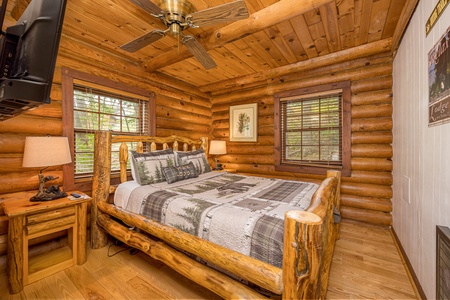 Bedroom With Log Bed at Moonlit Mountain Lodge