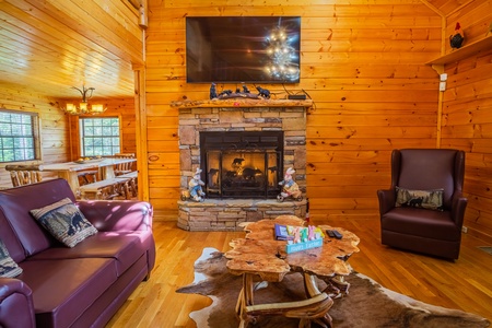 Livingroom fireplace at 3 Crazy Cubs, a 5 bedroom cabin rental located in pigeon forge