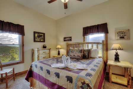 King log bed at The Best View Lodge, a 5 bedroom cabin rental located in gatlinburg