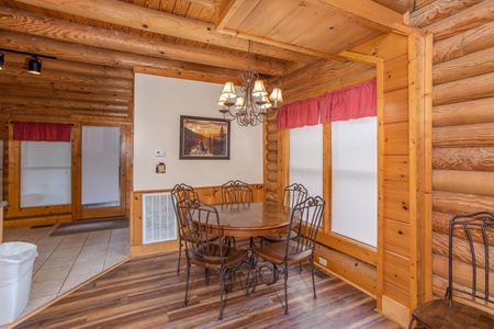 Dining table for five at Starry Starry Night #725, a 2 bedroom cabin rental located in Pigeon Forge