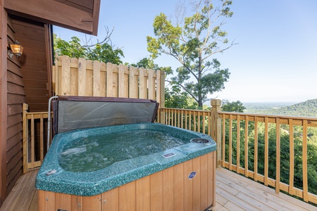 Hot tub at Cozy Mountain View, a 1 bedroom cabin rental located in Pigeon Forge
