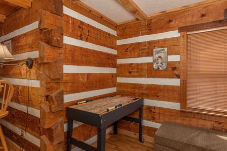 Shuffleboard game at Wild at Heart, a 1 bedroom cabin rental located in Gatlinburg