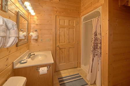 Bathroom with a walk in shower at A Place to Remember, a 2 bedroom cabin rental located in Gatlinburg