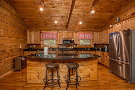 Kitchen and breakfast bar at Tammy's Place At Baskins Creek