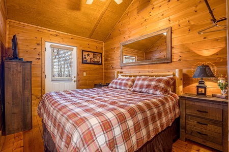 Master bedroom at Sunny Side Up, a 2 bedroom cabin rental located in Gatlinburg