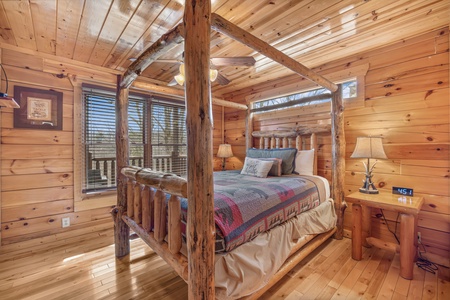 Main level queen bedroom at Natural Wonder, a 4 bedroom cabin rental located in Gatlinburg