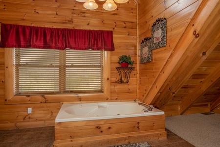 Jacuzzi in the loft bathroom at Better View, a 4 bedroom cabin rental located in Pigeon Forge