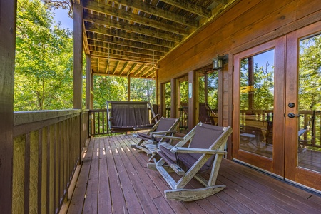 Adirondack rocking chairs at Moonbeams & Cabin Dreams, a 3 bedroom cabin rental located in Pigeon Forge
