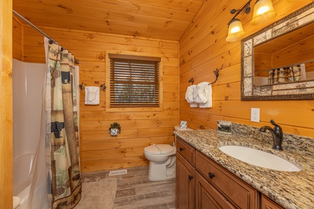 Bathroom with a shower at J's Hideaway, a 4 bedroom cabin rental located in Pigeon Forge
