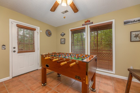 Foosball table at Copper Owl, a 2 bedroom cabin rental located in Pigeon Forge