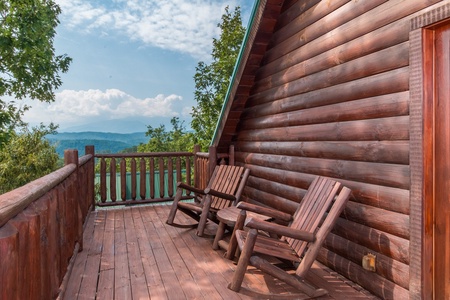 Seating on the deck at A Beautiful Memory, a 4 bedroom cabin rental located in Pigeon Forge