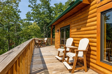 Upper deck seating at J's Hideaway, a 4 bedroom cabin rental located in Pigeon Forge