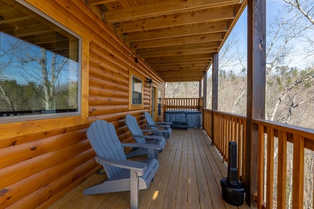 Deck with adirondack chairs at Everly's Splash, a 4 bedroom cabin rental located in Pigeon Forge