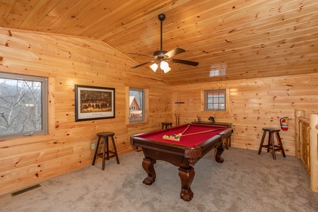 Pool table in the loft at Happy Bear's Hideaway, a 2 bedroom cabin rental located in Gatlinburg