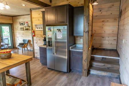 Refrigerator and Stairwell at Cozy Bear
