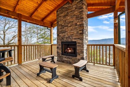 Fireplace on deck at Four Seasons Grand, a 5 bedroom cabin rental located in Pigeon Forge