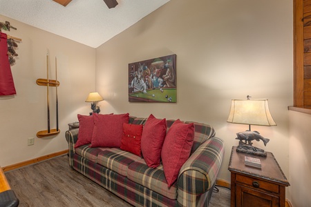 Sleeper sofa at Magic Moments, a 2 bedroom cabin rental located in Pigeon Forge