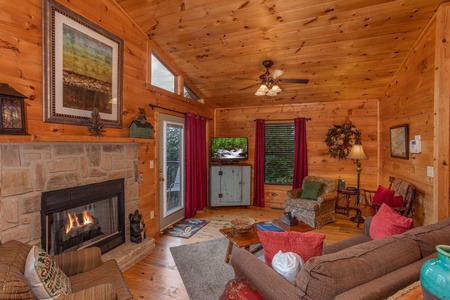 Living room with fireplace at A View for You, a 1 bedroom cabin rental located in Pigeon Forge