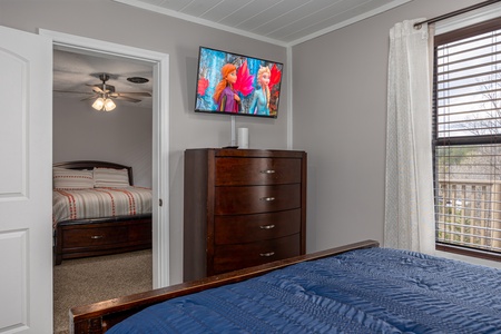 Bedroom dresser and flat screen tv at Hoop Dreams Lodge