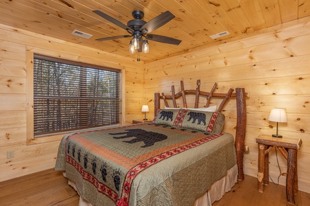 Bedroom with two night tables and lamps at Bessy Bears Cabin, a 2 bedroom cabin rental located inGatlinburg