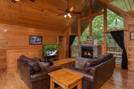 Living room with fireplace at Family Ties Lodge