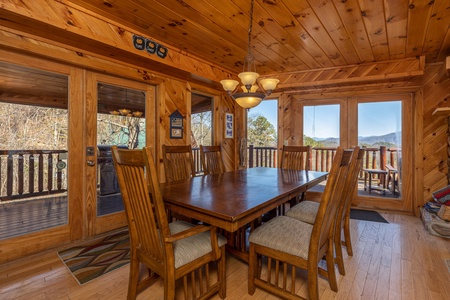 Dining table for six at Hatcher Mountain Retreat a 2 bedroom cabin rental located in Pigeon Forge