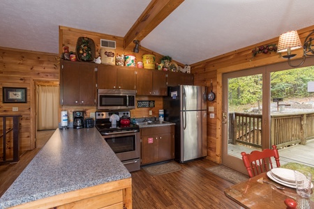 Kitchen with stainless appliances at Bird's Eye View, a 2-bedroom cabin rental located in Gatlinburg