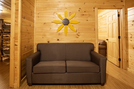 Loveseat at 3 Crazy Cubs, a 5 bedroom cabin rental located in pigeon forge