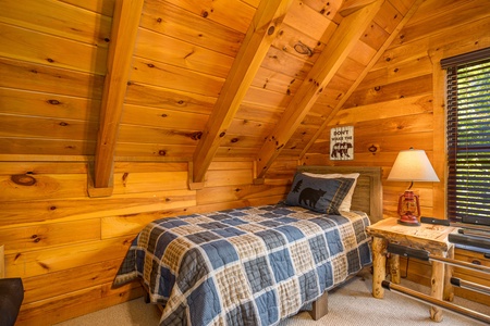 Twin Bed at Bear Feet Retreat, a 1 bedroom cabin rental located in pigeon forge