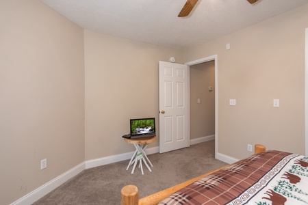 Television in the queen bedroom at Into the Woods, a 3 bedroom cabin rental located in Pigeon Forge