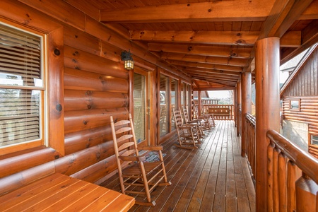 Covered deck with rocking chairs at Better View, a 4 bedroom cabin rental located in Pigeon Forge